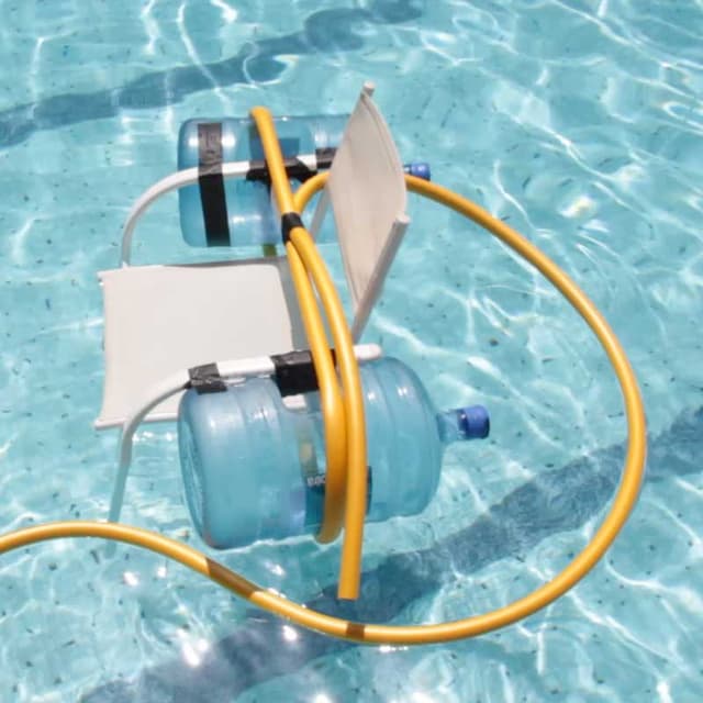 picture of a stool with two water-tanks strapped to its side