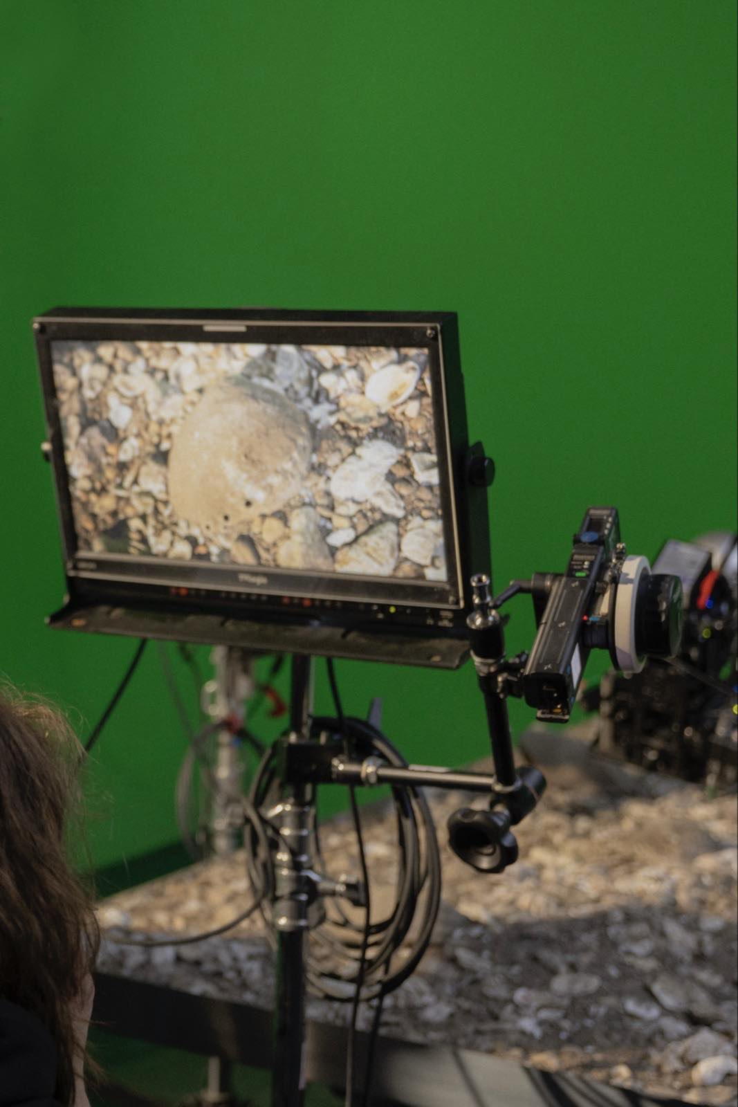footage of soil can be seen on a professional video control monitor